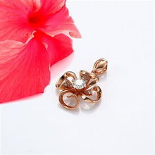 绽放颈间 0.38克拉红18K金栀子花开钻石吊坠全解析